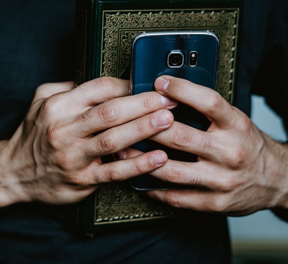 phone and religious book