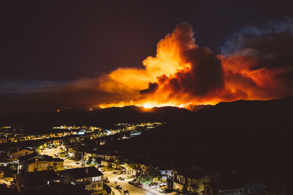 wildfires moving toward a city